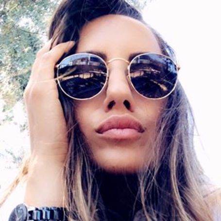 marijana with glasses on pouting for a selfie 